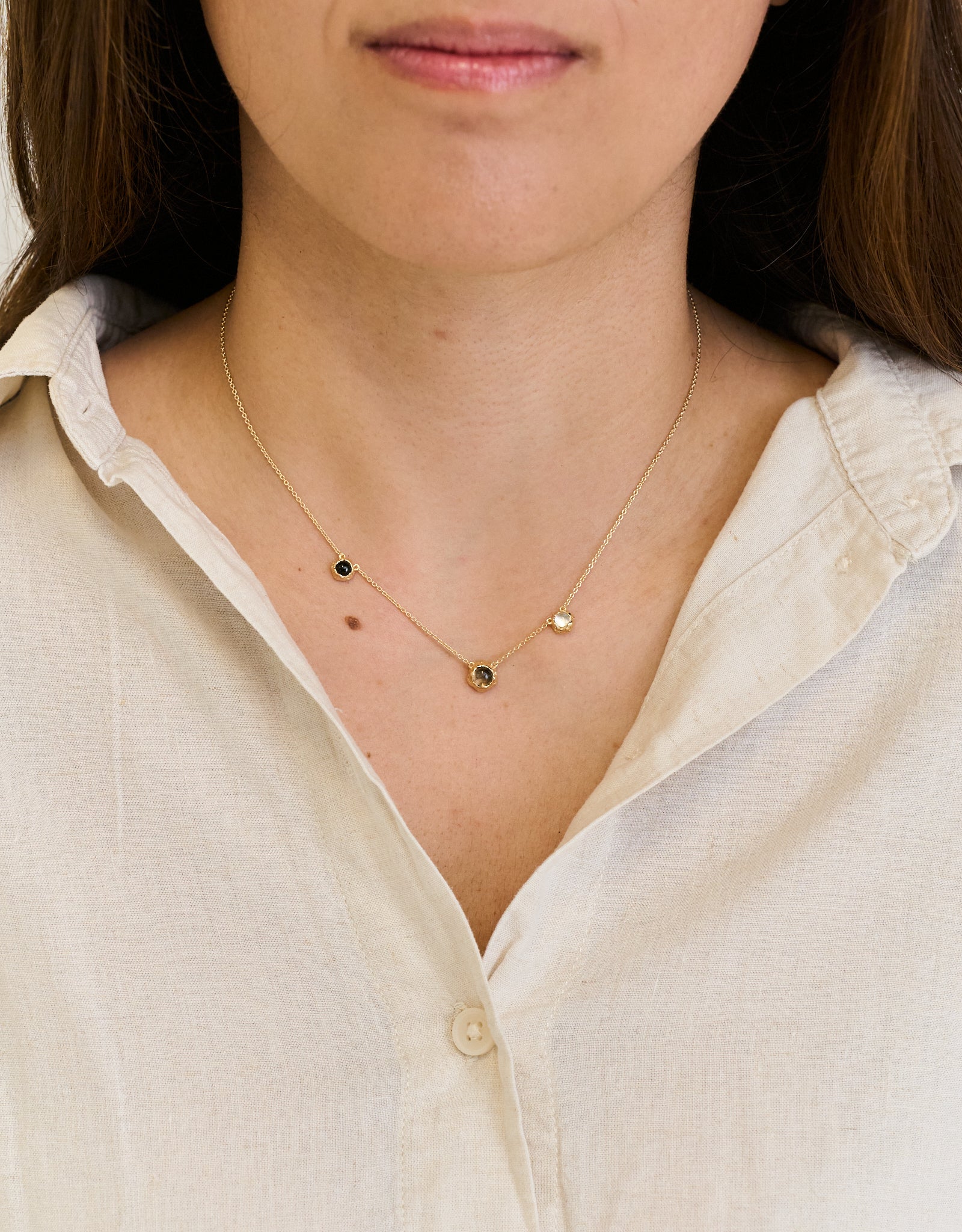 Close-up of No.2 Mind gold vermeil necklace with natural crystals