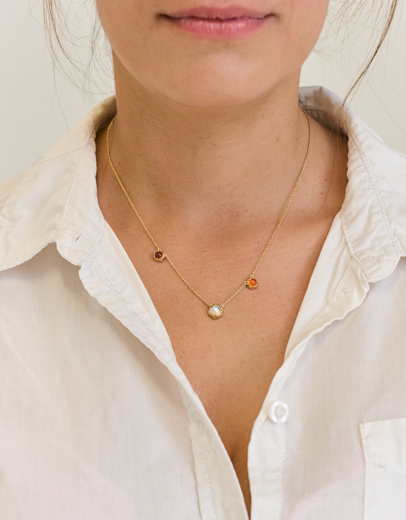 Close-up of No.2 Balance gold vermeil necklace with natural crystals